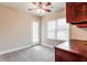 Home office or bonus room with neutral colors and built in cabinets at 2082 Blackberry Ln, Auburn, GA 30011