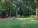 Beautiful backyard with a shed, manicured lawn, garden bed and a wooden fence at 4601 Gann Sw Xing, Smyrna, GA 30082