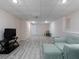 Spacious finished basement offering a comfortable seating area and potential for customization at 4601 Gann Sw Xing, Smyrna, GA 30082