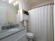 Bathroom featuring a granite countertop vanity and a shower with a curtain at 4601 Gann Sw Xing, Smyrna, GA 30082