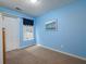 Cozy bedroom with blue walls and soft carpet offers a relaxing space for rest at 4601 Gann Sw Xing, Smyrna, GA 30082