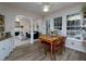 Open concept from dining area to living room with abundant windows at 4601 Gann Sw Xing, Smyrna, GA 30082