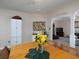Well-lit dining area with adjacent view into the living room and abundant natural light at 4601 Gann Sw Xing, Smyrna, GA 30082