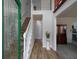 Elegant foyer with hardwood flooring, staircase, and views into the living spaces at 4601 Gann Sw Xing, Smyrna, GA 30082