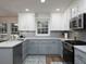 Beautiful kitchen featuring updated countertops, modern appliances, and stylish cabinetry at 4601 Gann Sw Xing, Smyrna, GA 30082
