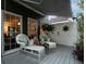 Relaxing porch with cozy white wicker seating and a shaded overhead canopy at 4601 Gann Sw Xing, Smyrna, GA 30082