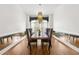 Dining room featuring modern lighting fixture and a large table with stylish chairs at 538 Sarabrook Pl, Sandy Springs, GA 30342