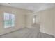 Bright bedroom with carpet, neutral walls, and a window at 70 Prince Edward Way, Covington, GA 30016