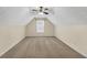 This bedroom features a ceiling fan and a window at 70 Prince Edward Way, Covington, GA 30016