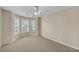 Bedroom featuring neutral walls, carpet, and natural light at 70 Prince Edward Way, Covington, GA 30016