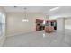 The kitchen offers modern appliances, tile floors, and an island at 70 Prince Edward Way, Covington, GA 30016