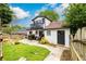 Charming backyard with patio, grilling area, and lush green grass at 1448 N Highland Ne Ave, Atlanta, GA 30306