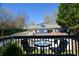 Cozy deck area with table and chairs, perfect for enjoying the neighborhood views at 1448 N Highland Ne Ave, Atlanta, GA 30306