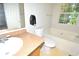 Bathroom with a tub and window at 2172 Cold Springs Cir, Lithonia, GA 30058