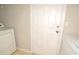 Laundry room with white appliances at 2172 Cold Springs Cir, Lithonia, GA 30058