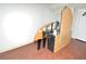 Room with a large cabinet and wood floors at 2172 Cold Springs Cir, Lithonia, GA 30058