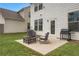 Backyard patio offers a grill and comfortable seating perfect for outdoor entertaining and relaxation at 2820 Aralynn Way, Atlanta, GA 30337