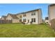 Large, grassy backyard with patio, great for outdoor activities and enjoying the natural light at 2820 Aralynn Way, Atlanta, GA 30337