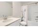 Clean bathroom features a shower with a floral curtain, a new sink and plenty of counter space at 2820 Aralynn Way, Atlanta, GA 30337