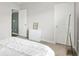 A simple bedroom with a white dresser and minimalist decor offers a calm space at 2820 Aralynn Way, Atlanta, GA 30337