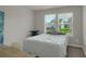 Comfortable bedroom with a neutral color palette, natural light, and functional desk space at 2820 Aralynn Way, Atlanta, GA 30337
