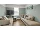 Inviting living room with comfortable seating, modern decor, and plenty of natural light through large windows at 2820 Aralynn Way, Atlanta, GA 30337