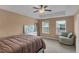 Tranquil main bedroom features tray ceiling, a sitting area, and soft carpet for a relaxing retreat at 2820 Aralynn Way, Atlanta, GA 30337