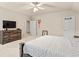 Bedroom with flatscreen, dresser and bright natural light at 4759 Highland Point Dr, Auburn, GA 30011