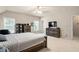 Bedroom with ceiling fan, dresser and bright natural light at 4759 Highland Point Dr, Auburn, GA 30011