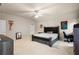 Bedroom with ceiling fan, dresser and bright natural light at 4759 Highland Point Dr, Auburn, GA 30011