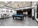 Entertainment room featuring a pool table, seating area and projector screen for leisure at 4759 Highland Point Dr, Auburn, GA 30011