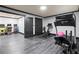 Workout room with a treadmill and arcade access for convenience and a balance of fun and exercise at 4759 Highland Point Dr, Auburn, GA 30011