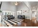 Bright living space with high ceilings, fireplace, and an open layout perfect for entertaining and relaxation at 4759 Highland Point Dr, Auburn, GA 30011