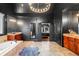 The luxurious bathroom features soaking tub, double vanities, and access to the Primary bedroom at 4759 Highland Point Dr, Auburn, GA 30011