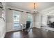 Bright office space features natural light, wood floors, and elegant trim work for a productive atmosphere at 4759 Highland Point Dr, Auburn, GA 30011