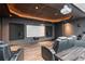 Movie room features a projector screen, theater seating and ambient lighting for the perfect night in at 4759 Highland Point Dr, Auburn, GA 30011