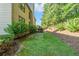 View of backyard and deck area with plenty of trees and greenery at 4771 Moon Chase Dr, Buford, GA 30519