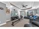 Finished basement featuring a large TV and plenty of room to relax and enjoy a movie at 4771 Moon Chase Dr, Buford, GA 30519