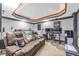 Finished basement area with comfortable seating and desk setup at 4771 Moon Chase Dr, Buford, GA 30519
