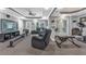 Finished basement featuring a home gym, living area, and walk out access to the backyard at 4771 Moon Chase Dr, Buford, GA 30519