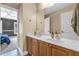 Bright bathroom featuring a double sink vanity at 4771 Moon Chase Dr, Buford, GA 30519