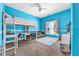 Bright bedroom with blue walls, white trim, and a cozy loft bed at 4771 Moon Chase Dr, Buford, GA 30519