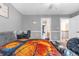 Bedroom featuring neutral walls and a peek to the hallway and bathroom at 4771 Moon Chase Dr, Buford, GA 30519