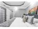 Modern bedroom with stylish decor, large bed and ceiling design at 4771 Moon Chase Dr, Buford, GA 30519