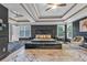 Bedroom with coffered ceilings, dark accent walls and carpet floors at 4771 Moon Chase Dr, Buford, GA 30519