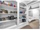 Built in shelves adjacent to the bedroom for decoration and storage at 4771 Moon Chase Dr, Buford, GA 30519