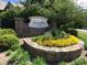 Stone sign for 'Summer Haven' amidst lush landscaping, enhancing the community's inviting and attractive entrance at 4771 Moon Chase Dr, Buford, GA 30519
