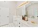 Bright bathroom with double vanity, tile floors and plenty of natural light at 533 Coolsprings Walk, Woodstock, GA 30188