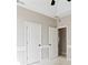 Bedroom with a large window, neutral colors, carpeted floors at 533 Coolsprings Walk, Woodstock, GA 30188