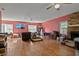 Large living area with a brick fireplace and lots of natural light at 533 Coolsprings Walk, Woodstock, GA 30188